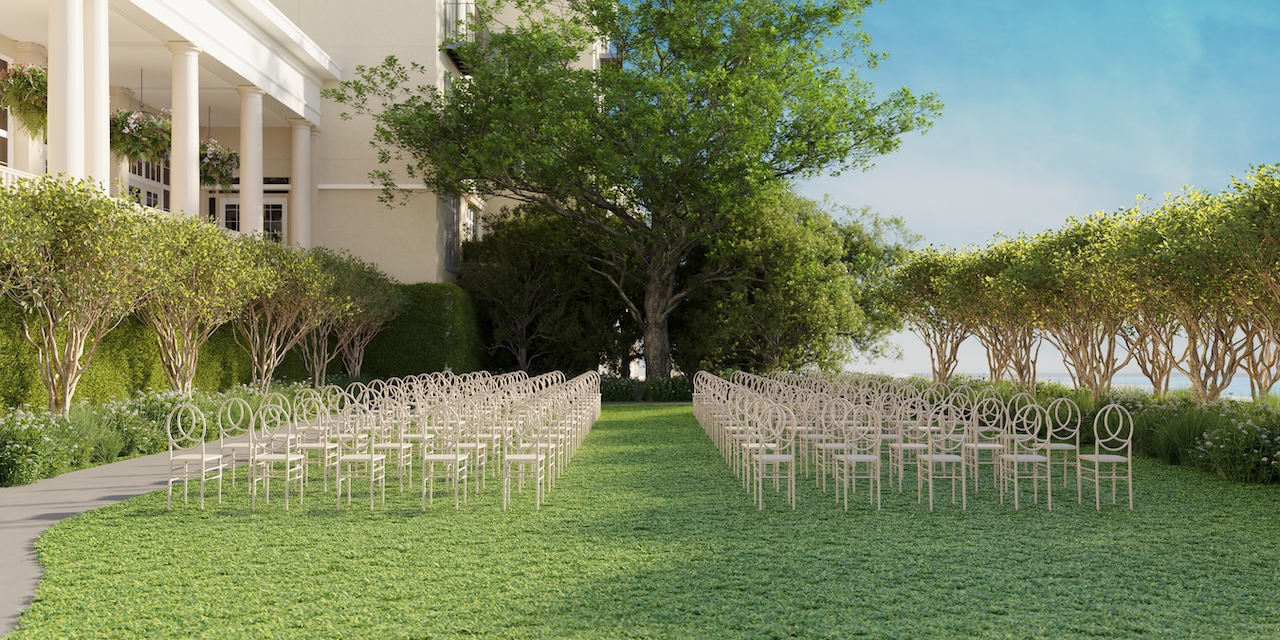 Outdoor ceremony area with chairs and trees at The Cooper in Charleston, perfect for meetings and events.