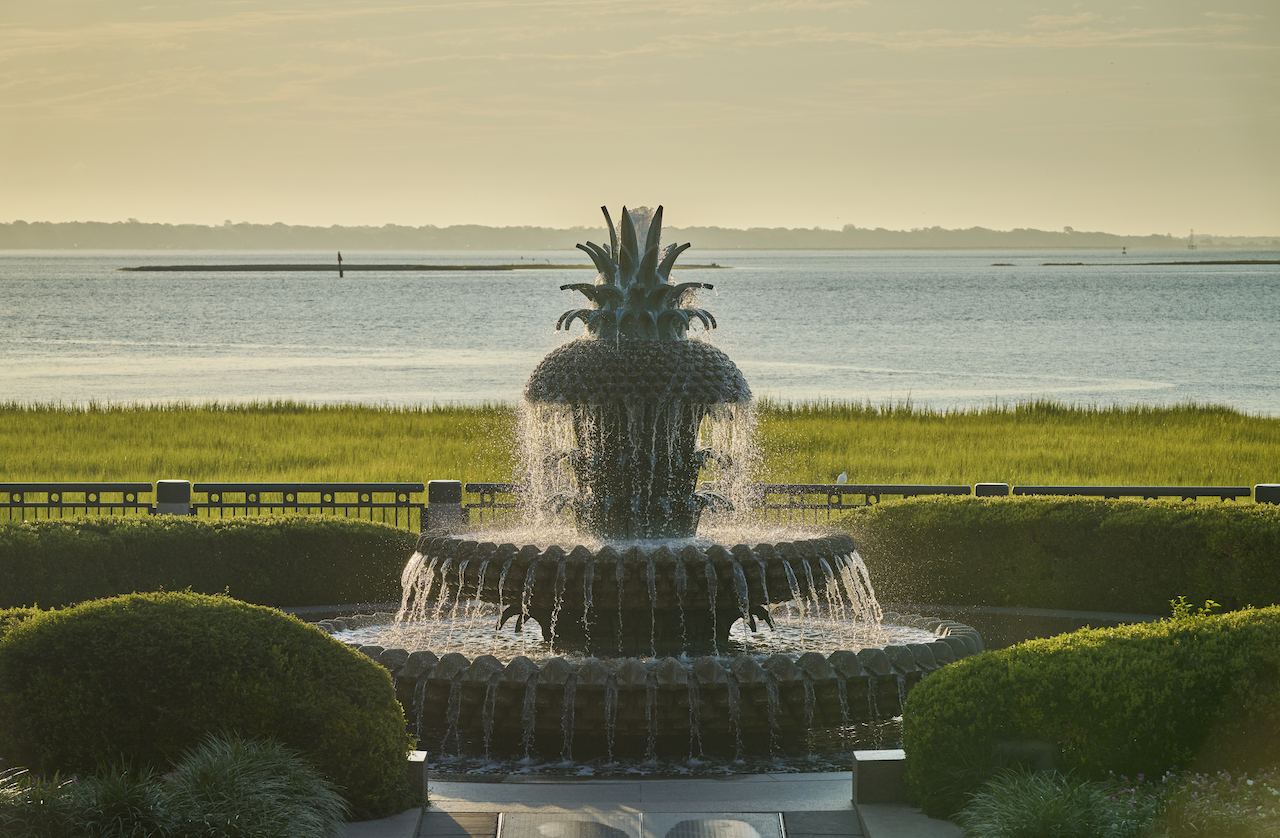 A pineapple-topped fountain, adding a touch of tropical charm to the surroundings.